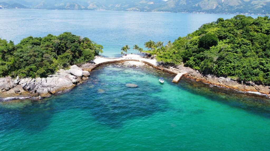 pexels-photo-20235073-20235073 Stunning aerial view of a tropical island in Angra dos Reis, Brazil, surrounded by turquoise ocean water.